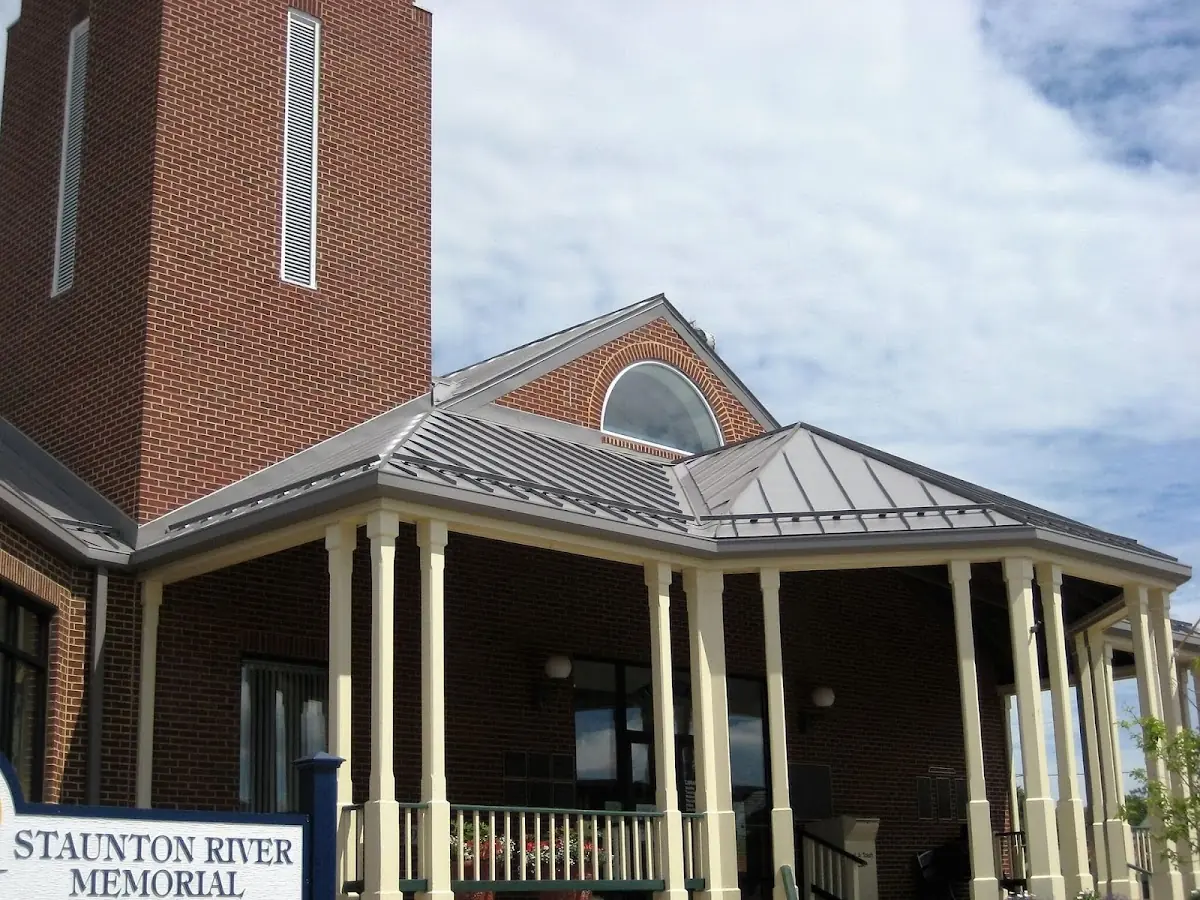 Skilled roofing craftsmen working on a residential roof in North Platte